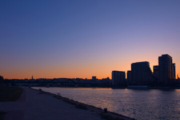 Fototapeta premium Dawn view of Belgrade city building on the river Sava, capital of Serbia.