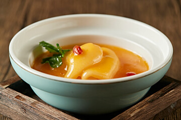 Fish maw stewed in soup with sauce