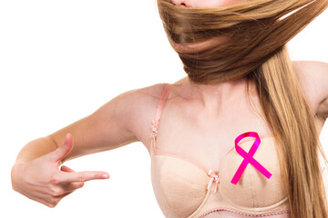 Woman chest in bra, pink cancer ribbon