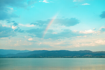 Rainbow at the sky over Lake Doiran in North Macedonia
