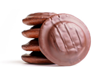 Close-Up of Stacked Chocolate-Covered Cookies on White Background