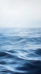 Fototapeta premium Calm ocean waves under a serene sky