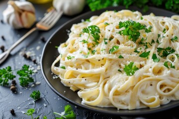 A delicious plate of fettuccine Alfredo with a creamy garlic Parmesan sauce, garnished with fresh parsley. Copy space