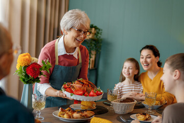 Family celebrating Thanksgiving Day