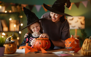 Happy family preparing for Halloween.
