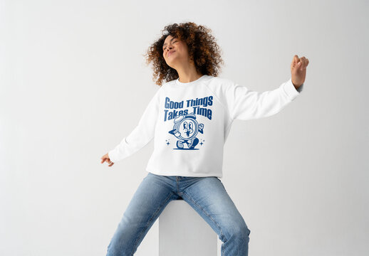 Mockup Of Woman Wearing Customizable Sweatshirt In Studio