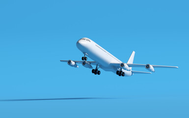 White airplane flying on blue sky background
