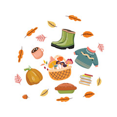 Colourful fall essentials, warm sweater, pumpkin, boots and pie surrounded by autumn leaves
