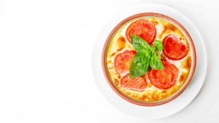 Italian tomato and basil lasagna in a white dish, perfect for celebrating World Vegetarian Day or Italian National Day