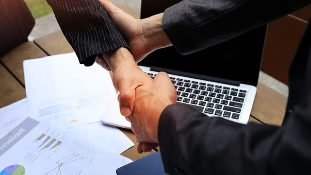 Businessteam of deal which handshake man and Success concept of handshaking after successful deal job