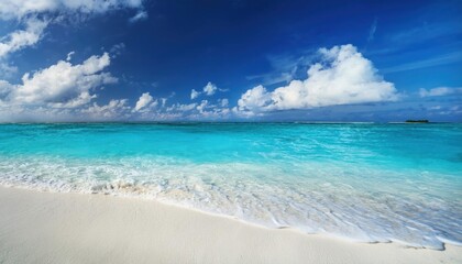 Fototapeta premium Beautiful sandy beach with white sand and rolling calm wave of turquoise ocean on Sunny day 