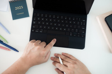 Close up of men using Tablet with stylus at office