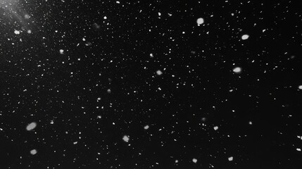 Obraz premium Slow Motion Snowfall on Black Background