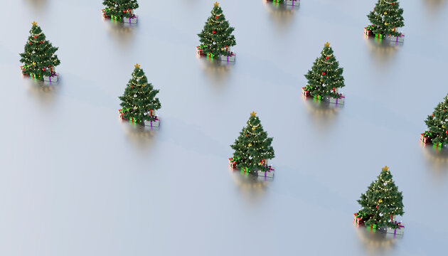 Decorated Christmas trees arranged on colored background