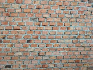 The red brick walls ae neatly arranged