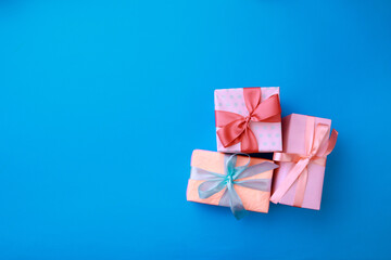  Gift boxes  on color background. Happy womens day. Happy Mothers day.Hello Spring- Image