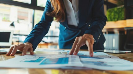 Obraz premium Corporate Receptionist Pointing to Office Map