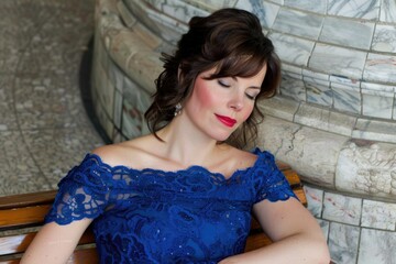 Fototapeta premium Italian woman in blue dress relaxes at shopping mall.