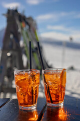 Children and adults, happy family in winter clothing at ski vacation, skiing, winter