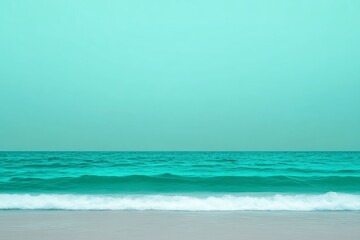 Fototapeta premium Tranquil ocean view with turquoise waters against a pastel sky.