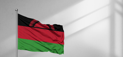 Malawi national flag cloth fabric waving on beautiful window light grey Background.