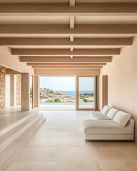 Modern interior living space with large windows overlooking a serene coastal view in a Mediterranean-style home