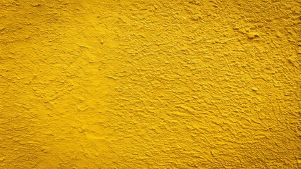 Fototapeta premium Bright yellow textured concrete wall background, perfect for creative designs and artistic projects, offering a unique