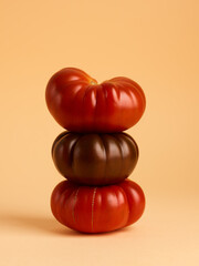 natural farm tomatoes over beige background