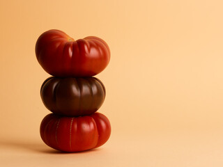 natural farm tomatoes over beige background
