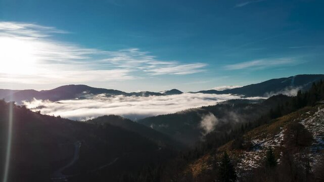 Time lapse of the sunrise and the fogs in the mountain
