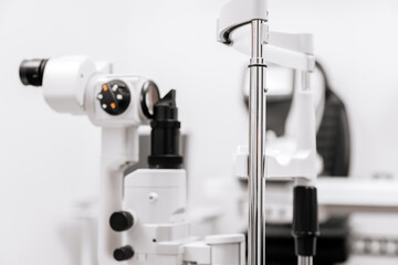 A detailed view of laser equipment for vision diagnostics and correction in an ophthalmologist's office. An ideal tool showcasing modern methods of eye care and treatment of visual disorders.
