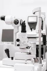 A detailed view of laser equipment for vision diagnostics and correction in an ophthalmologist's office. An ideal tool showcasing modern methods of eye care and treatment of visual disorders.