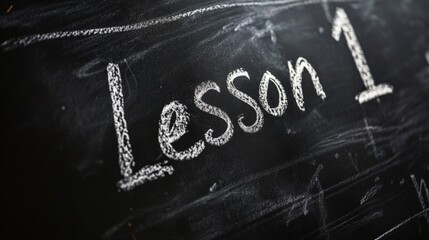 Fototapeta premium Lesson 1: Handwritten Text on Blackboard for Education and Learning