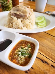 Steamed rice topped with chicken Singaporean food