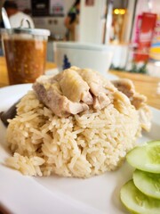 Steamed rice topped with chicken Singaporean food