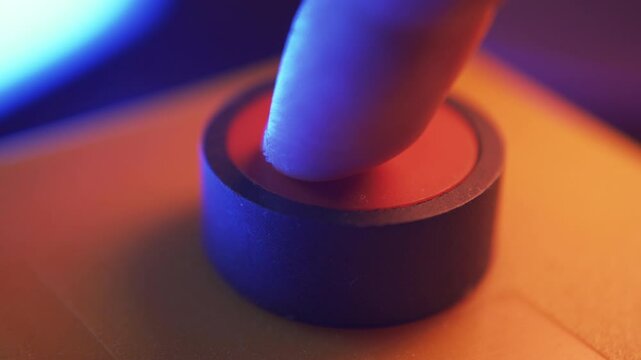 Pushing a red circular button