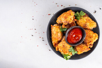 Grilled roasted spicy chicken thigh with ketchup