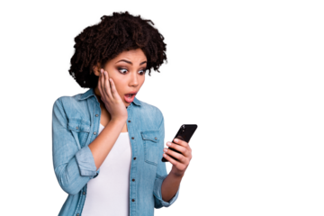 Portrait of astonished youth reaction stupor scream shout get news unbelievable unexpected omg touch hand chin hold device wear modern denim clothes isolated grey background