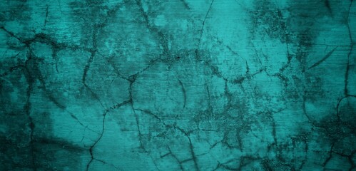 Obraz premium The background of the long wall is green with a combination of blue, Close-up of the facade of a building. Sunlight. Natural colors.