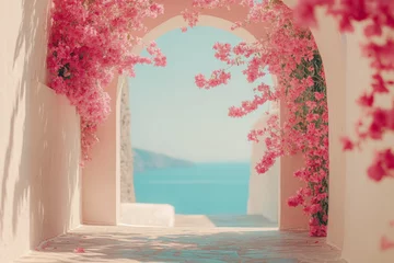 Photo sur Plexiglas Beautiful pink flowers frame a serene coastal view in a narrow alleyway during sunset