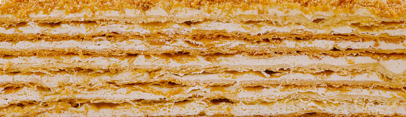 Delicious multi layered napoleon cake close up showing texture