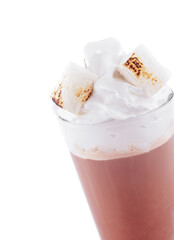 Delicious cocoa drink with marshmallows and whipped cream in irish glass