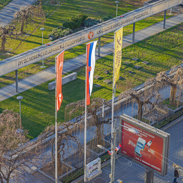 Aerial View of Yugoslav Drama Theatre Sign and Flags in Belgrade Serbia
