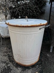 Fototapeta premium The old trash can is rusty.