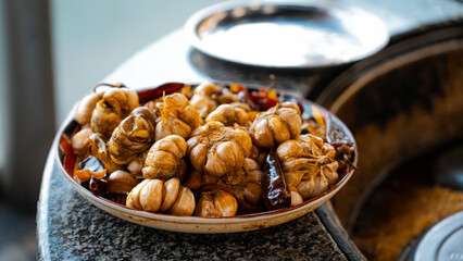 traditional oriental Arabic Uzbek pilaf with meat in a cauldron. Central Asian Pilaf Center in Uzbekistan in Tashkent