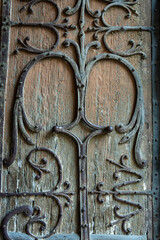 Ironwork detail on the entrance door of Basilica Notre-Dame d'Orcival in Puy-de-Dôme
