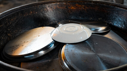 traditional oriental Arabic Uzbek pilaf with meat in a cauldron. Central Asian Pilaf Center in Uzbekistan in Tashkent