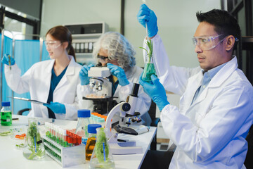 Team Microbiologists Analyzing Molecular Samples in Advanced Food Science Laboratory, Dietitian...