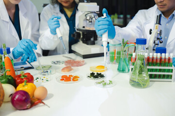 Team Microbiologists Analyzing Molecular Samples in Advanced Food Science Laboratory, Dietitian food and medicine.