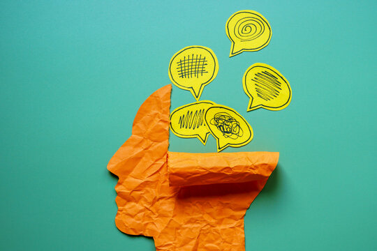 A crumpled head symbolizes overwhelming stress and negative thoughts. Anxiety and mental strain.